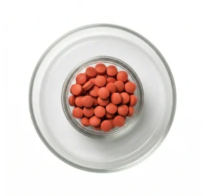 Rote 4-PrO-MET Pellets 20mg in einer Glasschale